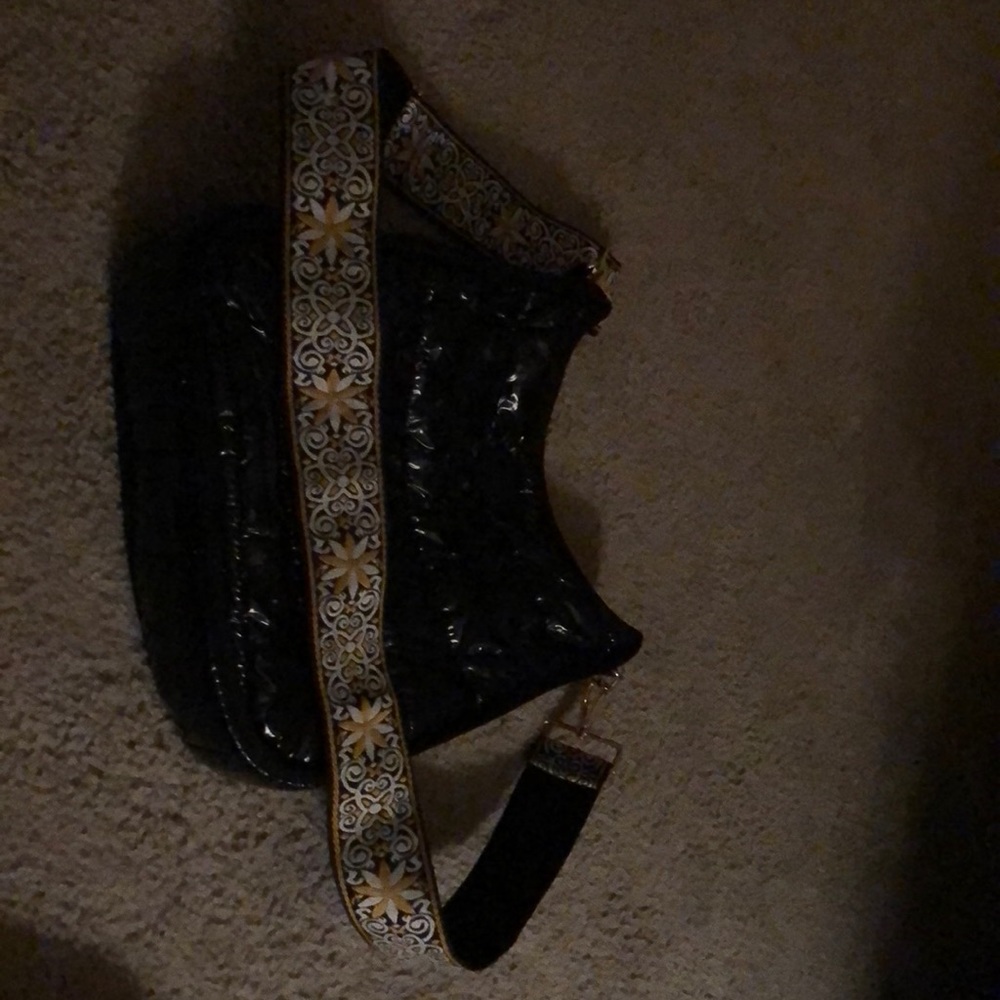 Ah dorned black cross body - gold patterned strap